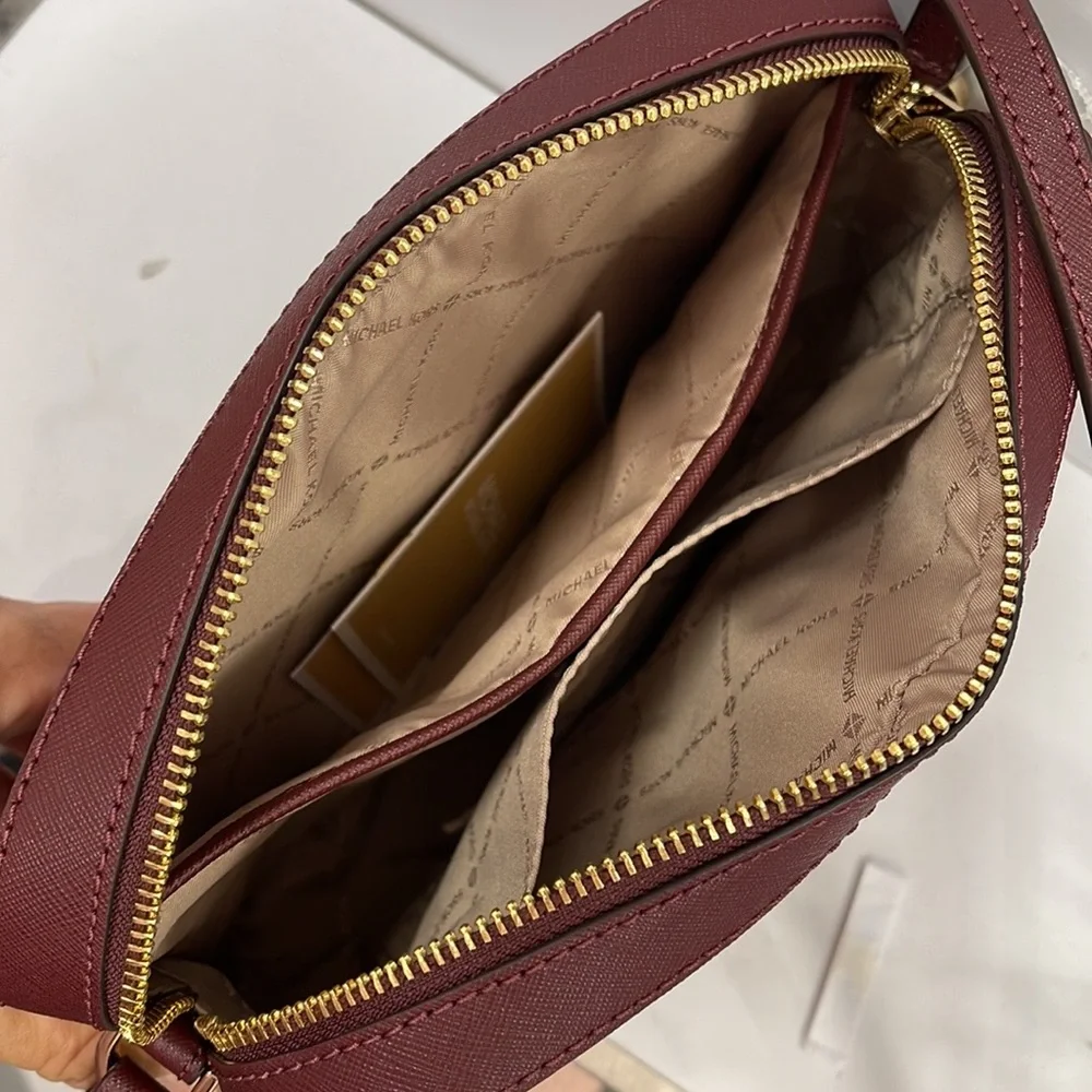 Michael Kors Jet Set Item Large East West Zip Chain Crossbody 
Merlot - Picture 10 of 16